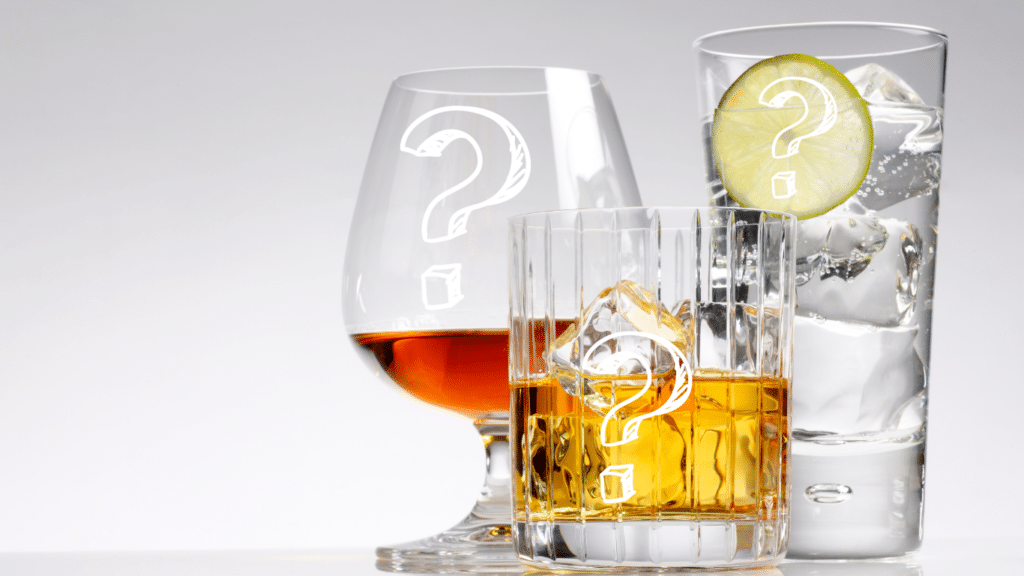 Three glasses of alcohol sit on a surface against a white background. Each glass has a white question mark on it.