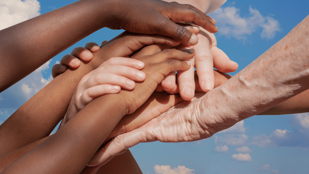 Hands of different ethnicities.