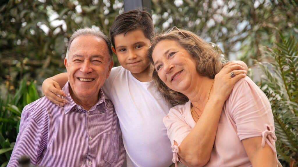 A child with his grandparents.
