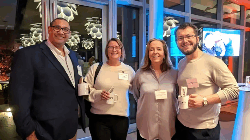 From left to right: Board members Chris Roy, Merel Veldhuis, and Adrienne Murphy with bursary recipient Nat.